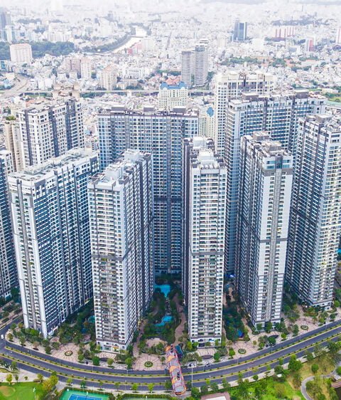 Panorama from high view of district 2, Ho Chi Minh city, Vietnam with condominium real estate projects and buildings, river to reflect Real Estate Development Vietnam.