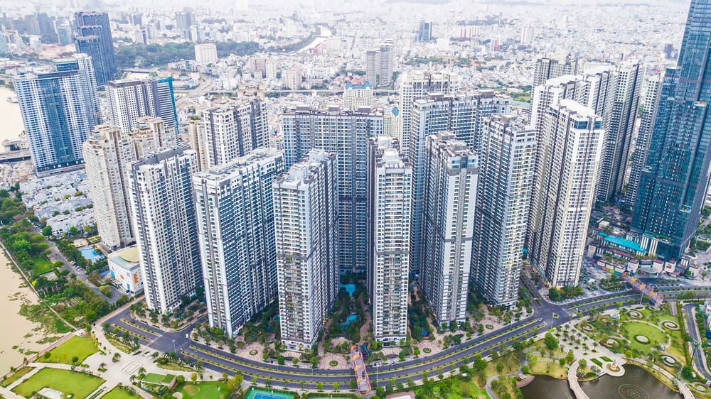 Panorama from high view of district 2, Ho Chi Minh city, Vietnam with condominium real estate projects and buildings, river to reflect Real Estate Development Vietnam.